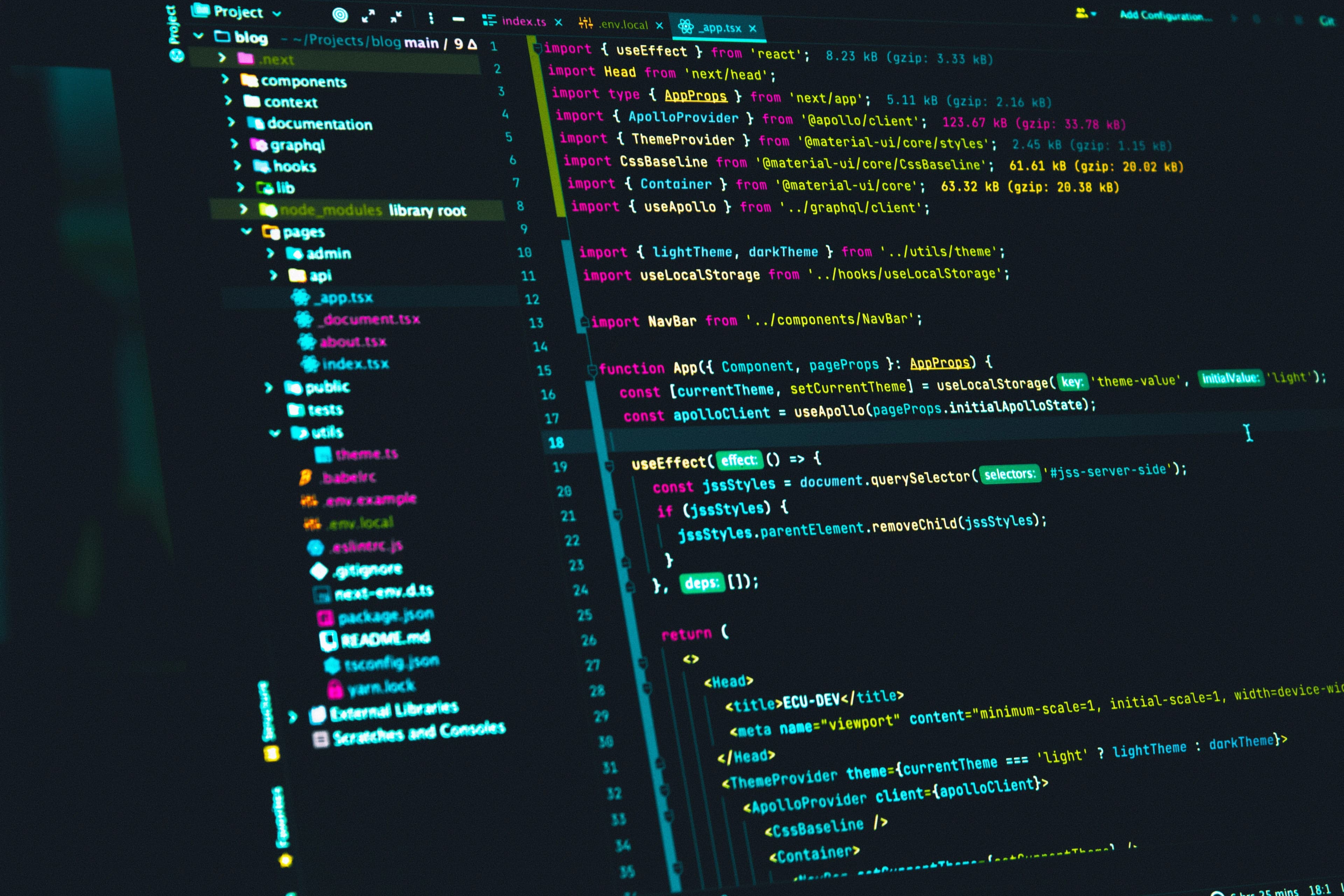 Close-up of a computer screen displaying colorful code lines in an integrated development environment, with a sidebar showing files and folders.